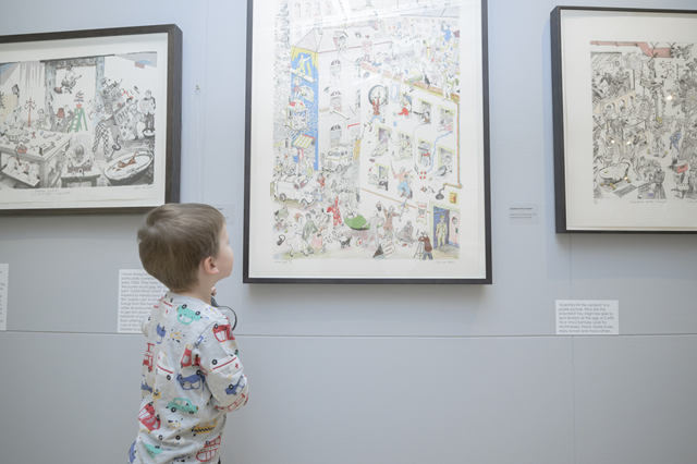 A young visitor to Rugby Art Gallery and Museum takes a closer look at a Chris Orr print during the artist's Domestic Fantastic: Prints and Paintings exhibition in February.