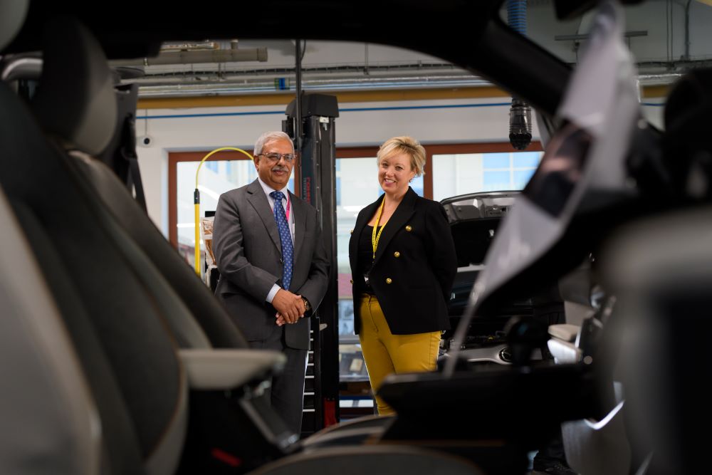 Cllr Ish Mistry and WCG CEO and Principal, Sara-Jane Watkins, at the new Rugby College Motor Vehicle Workshop.