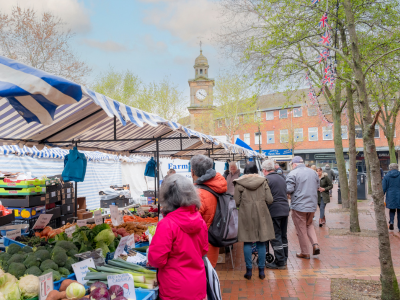 Image of Rugby market with people looking at market stalls
